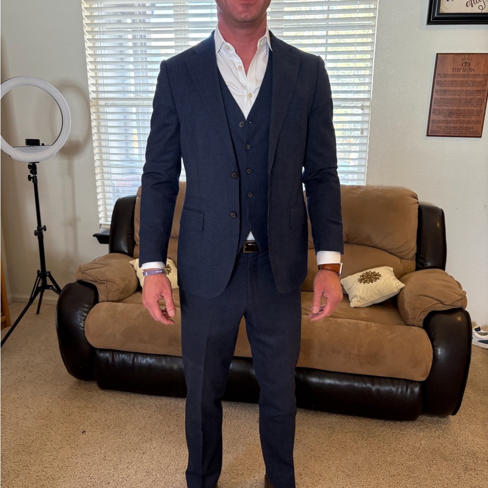 Suitsupply Blue Three-Piece Suit Sleek and Professional
